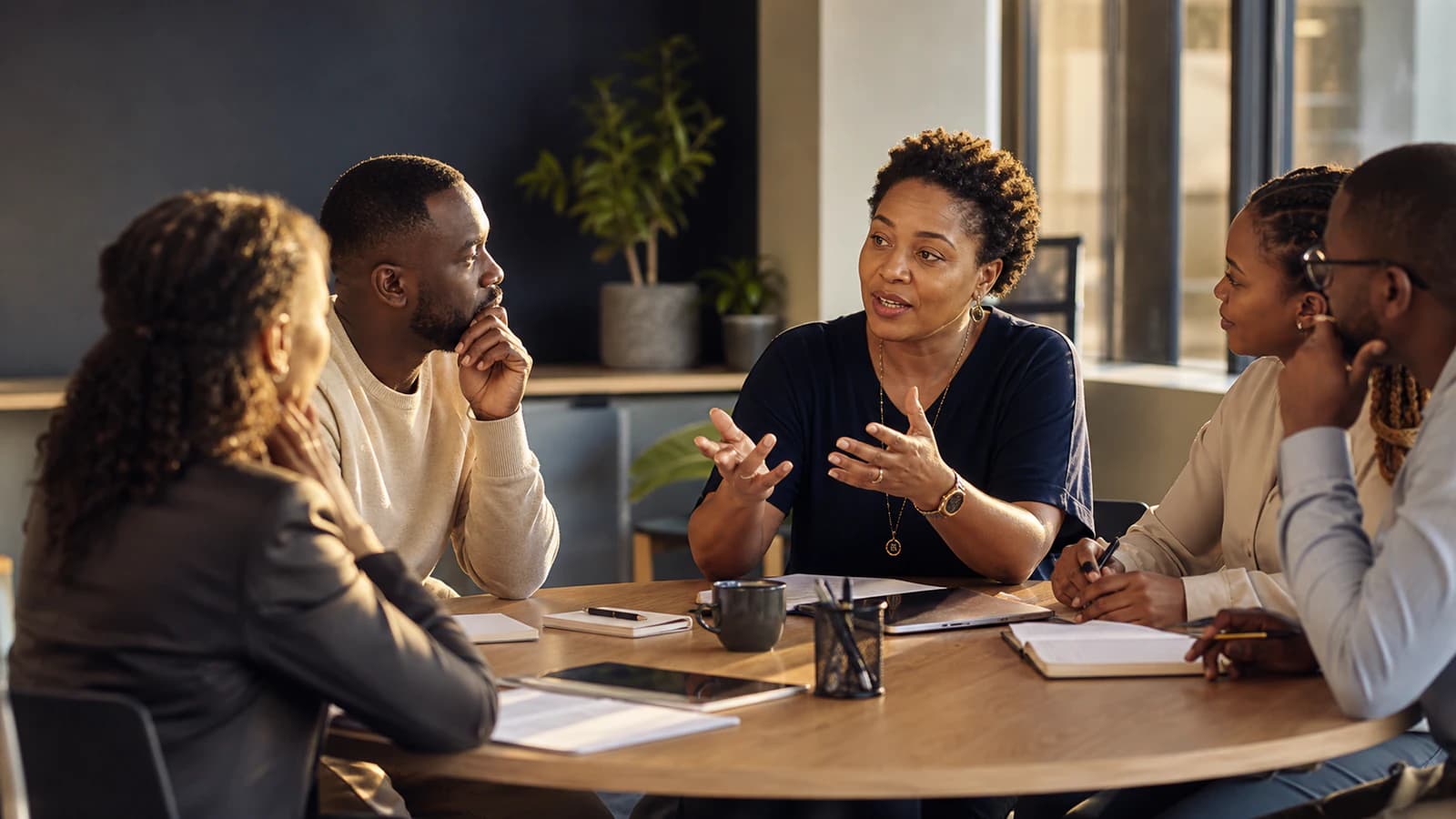 An inclusive leader guides a team toward a shared decision.