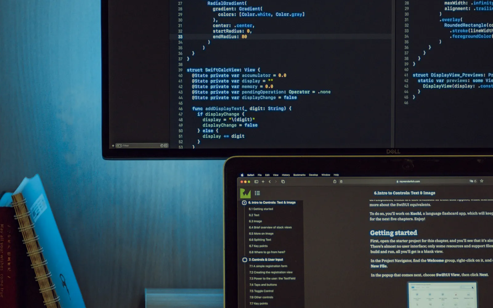 Swift code and an app-development tutorial on a monitor and laptop.
